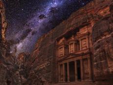Carved into soft stone cliffs, the ancient sandstone city of Petra was built in the 3rd century BC by the Nabataeans. These people were a nomadic Arab tribe–Bedouins–who roamed the Arabian Desert in search of pasture and water for their herds.